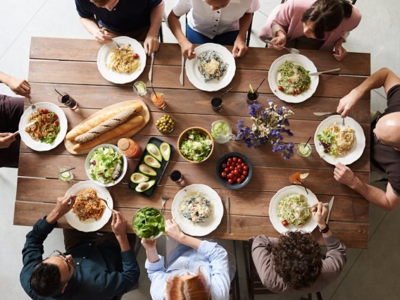 Group of people eating together