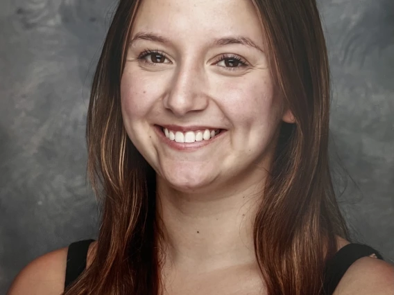 Person smiling for photo headshot